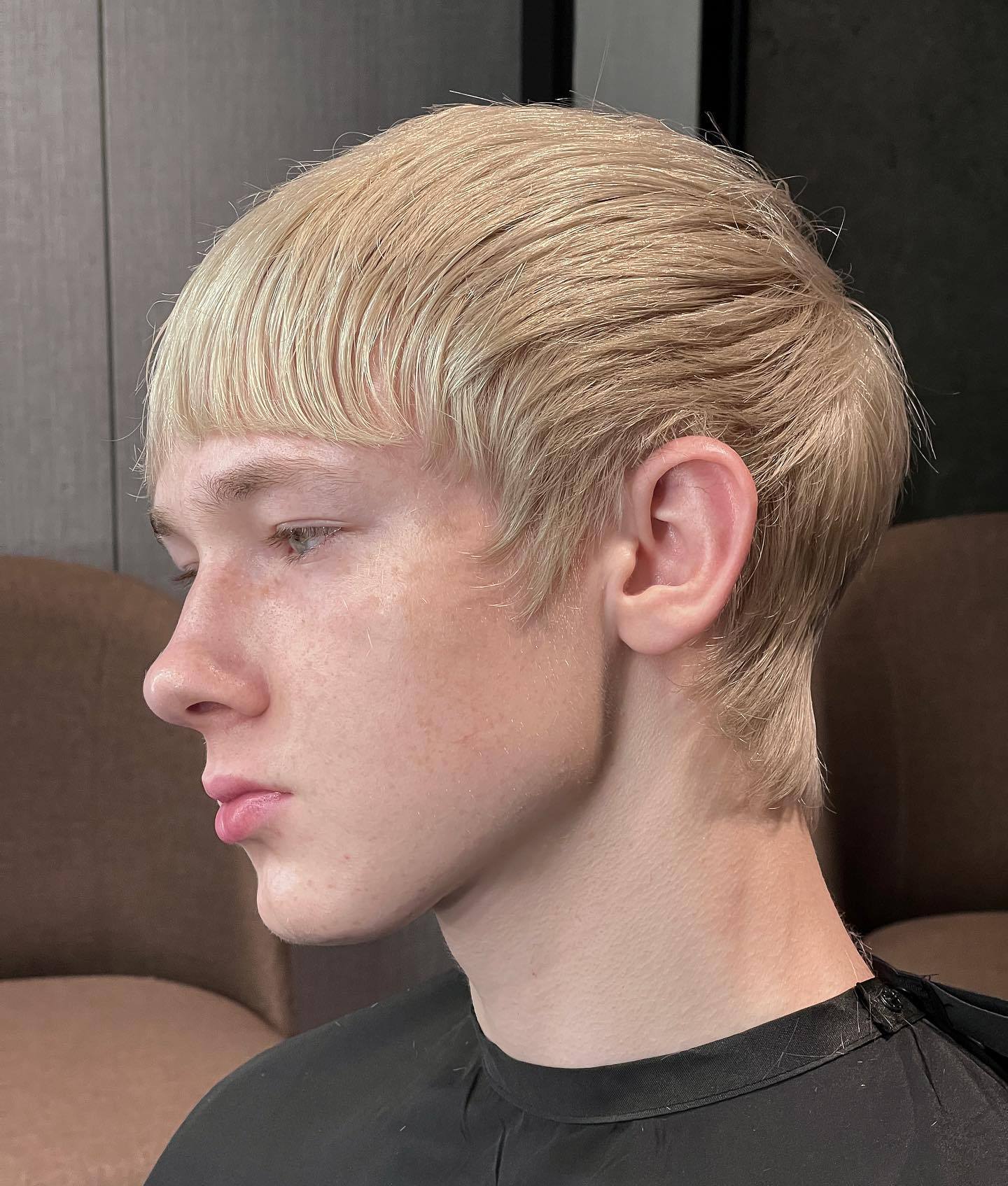 Medium Layered Blonde Hairstyle for Guys